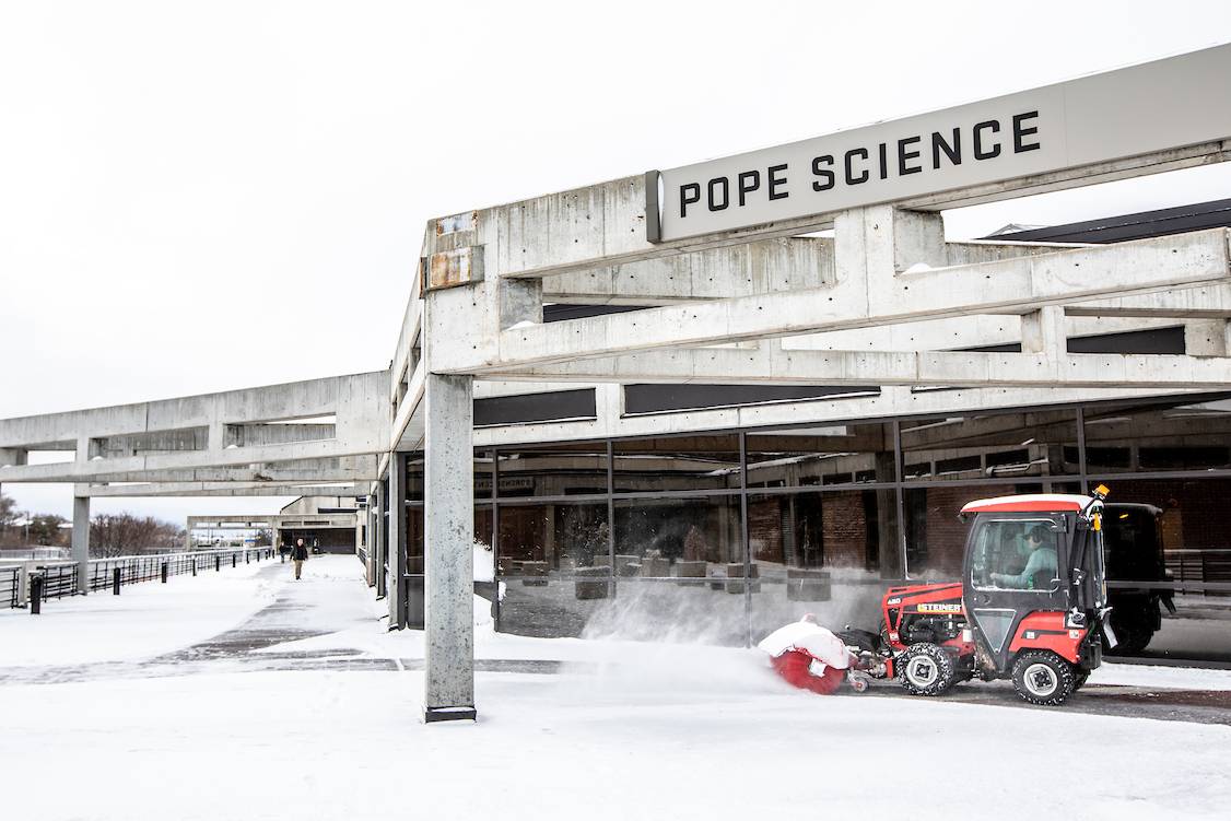 Clearing snow near Pope Science building