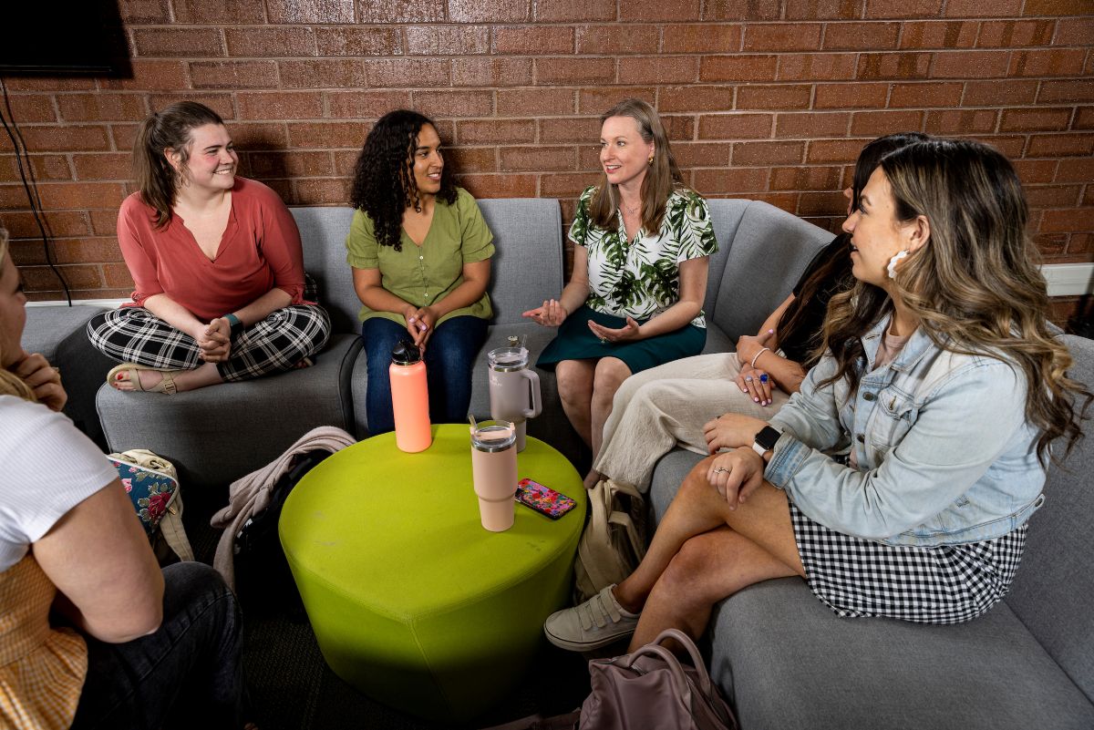 Person counseling a group of people