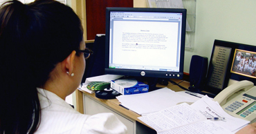 Women at Office Desk Computer