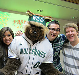 Students and mascot celebrating