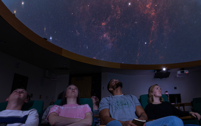 students looking at the stars
