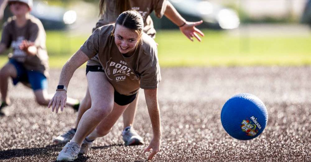 people playing kickball