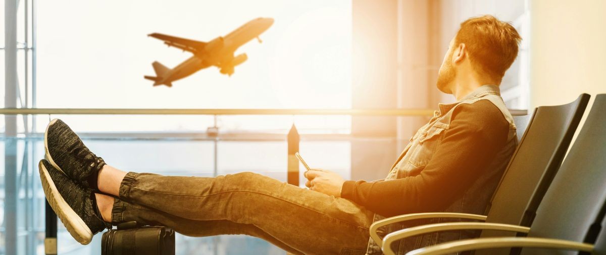 person waiting to board an airplane