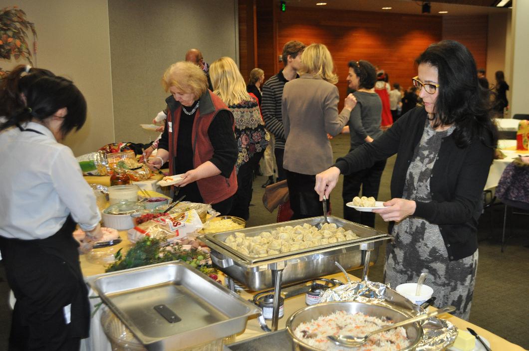 Members of Utah's Russian community enjoy traditional Russian food