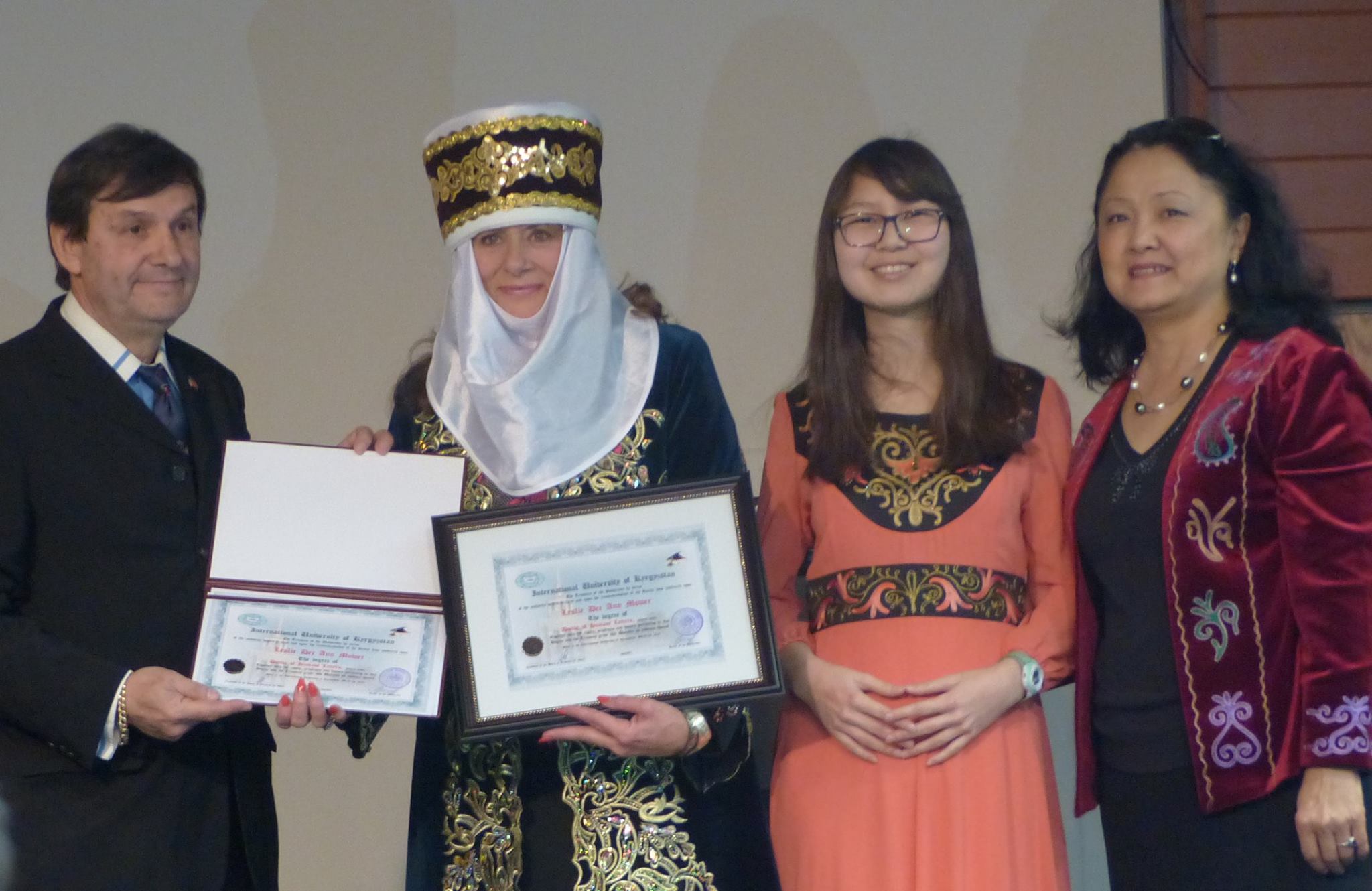 Leslie Dee Ann Mower receives an Honorary Doctorate of Humane Letters from Kyrgyz International University.