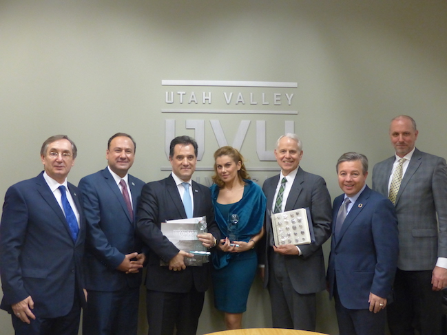 Mr. Adonis Georgiadis and Mrs. Eugenia Mandolides receiving Guest Professor awards from Senior Vice President, Jeff Olson.