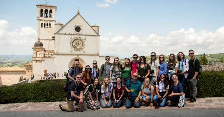 Students posing infront of building