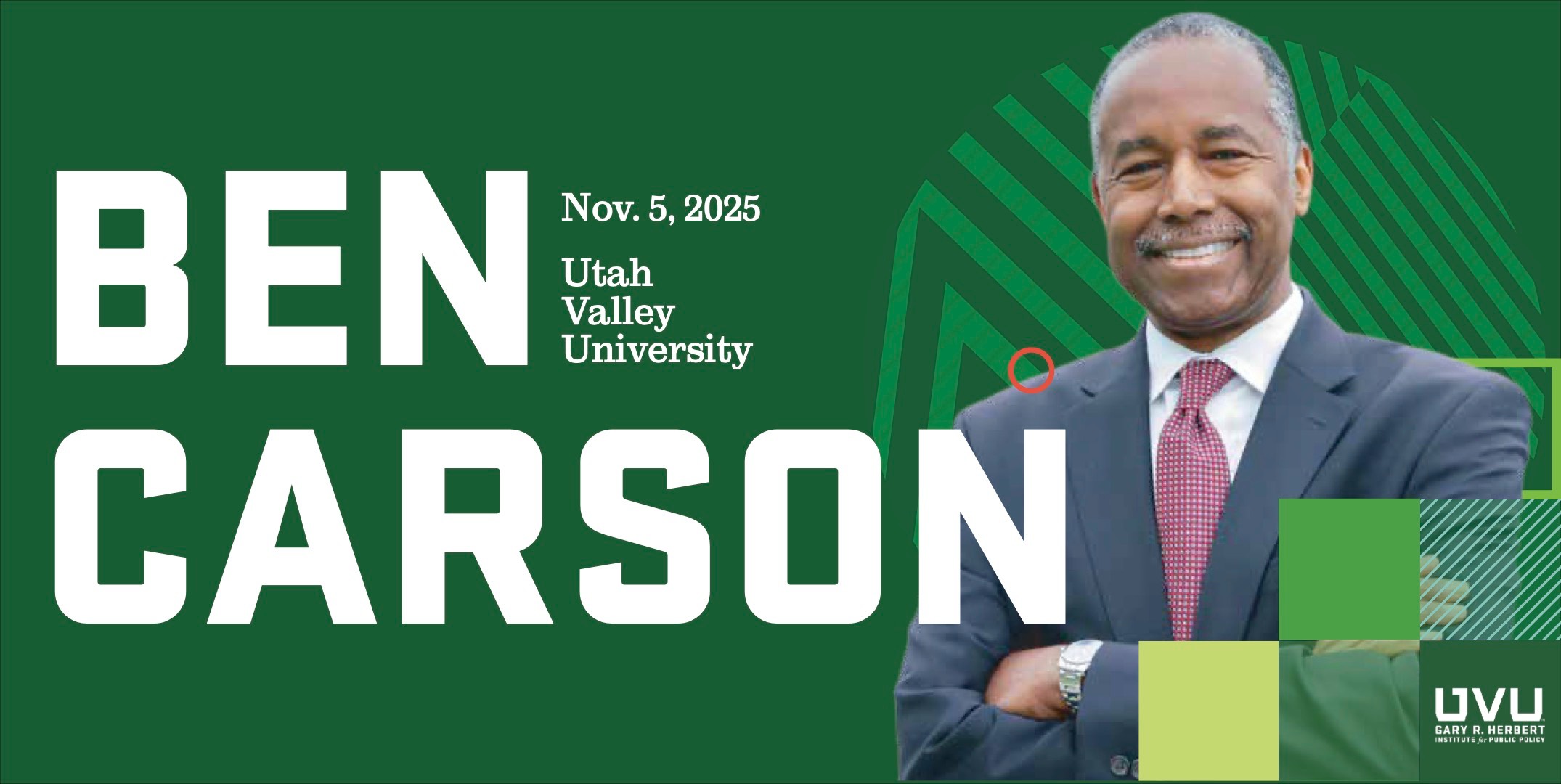 Dr. Ben Carson smiling with arms crossed