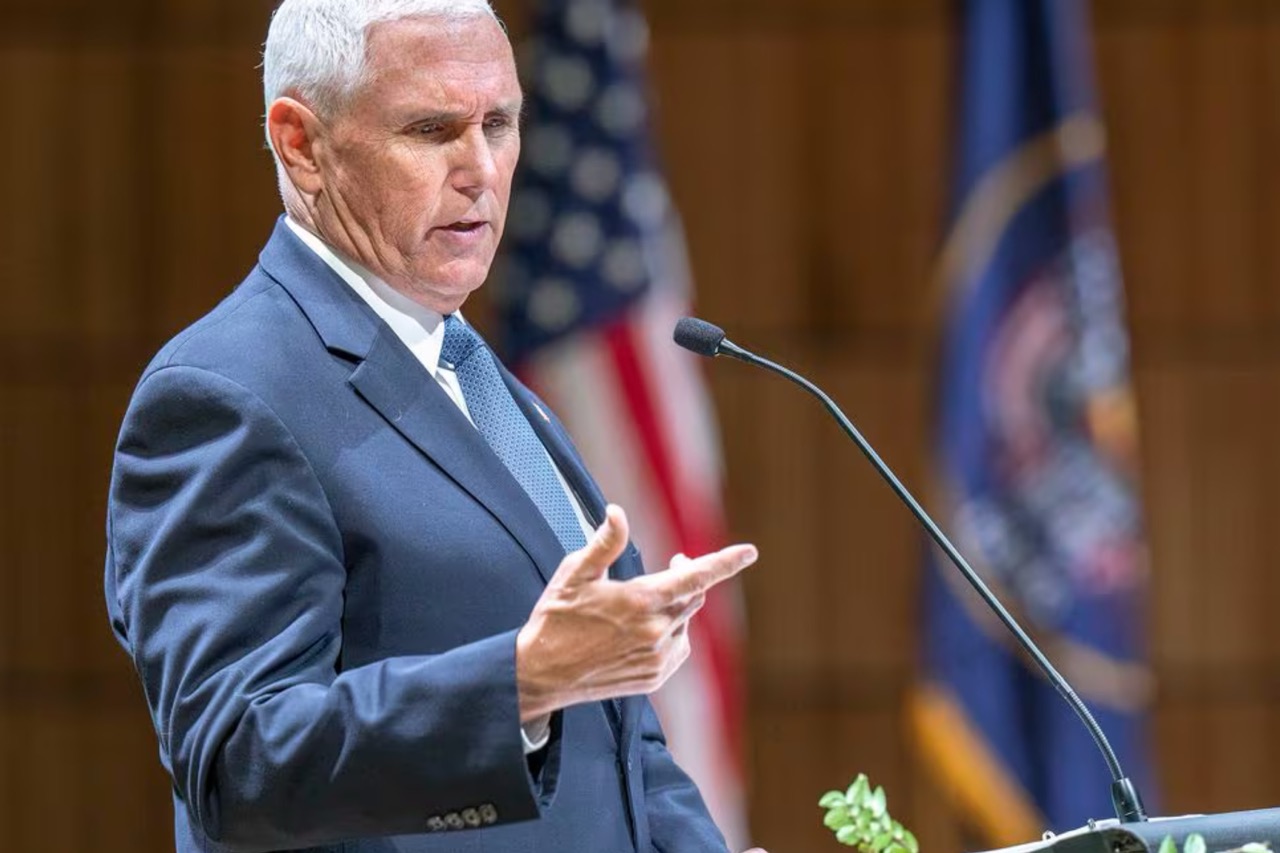 Pence on stage at UVU