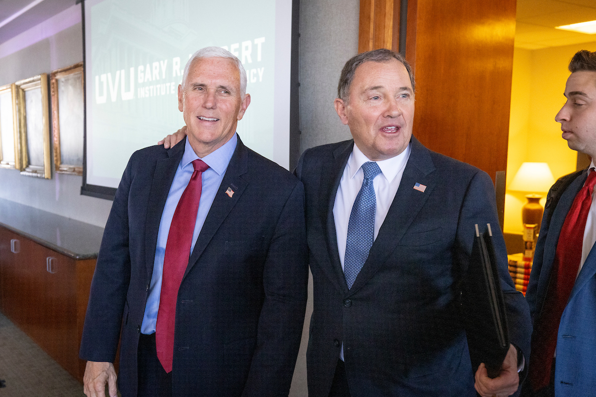 Herbert and Pence pose for a photo together