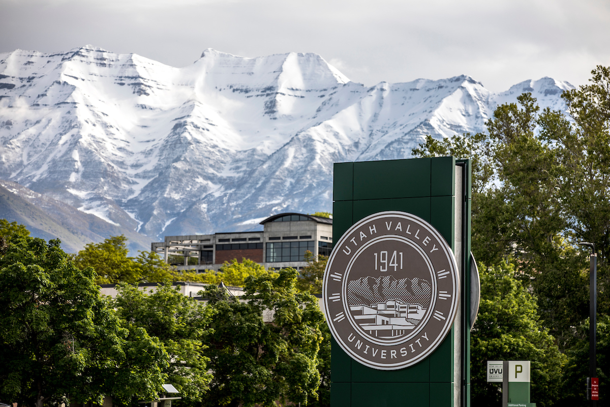 UVU Seal with Mountains Overlooking Campus