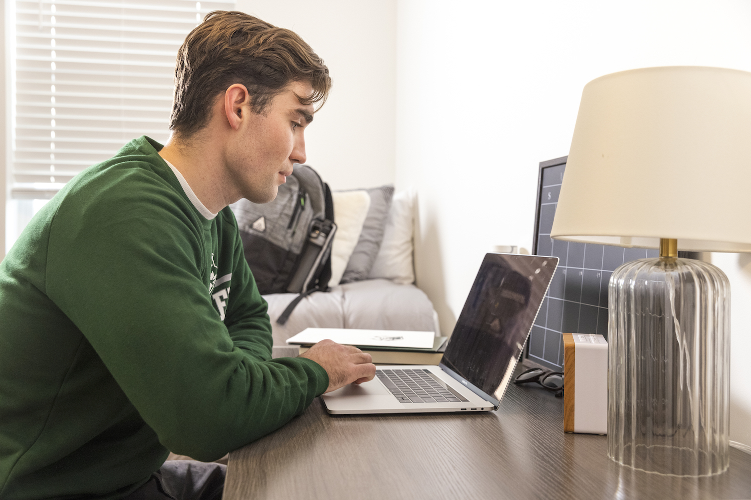 student studying in apartment