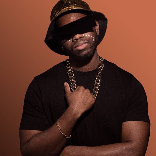 black man in hat with gold chain