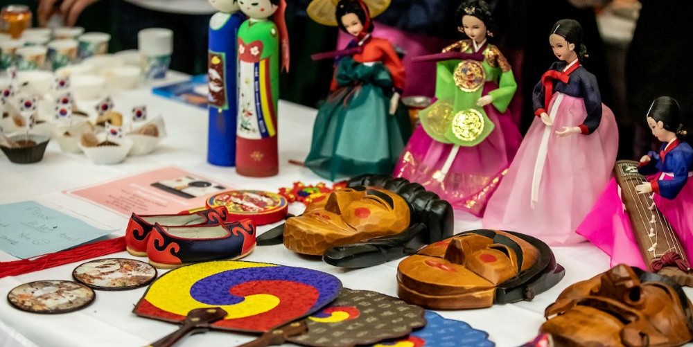 Multicultural works displayed on a table