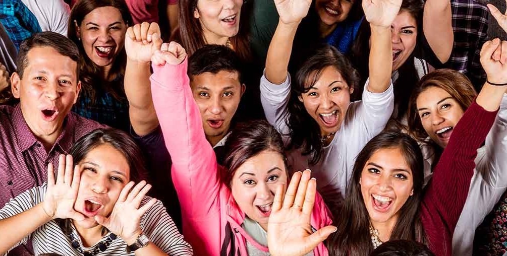 Students of a diverse population pose for a photo