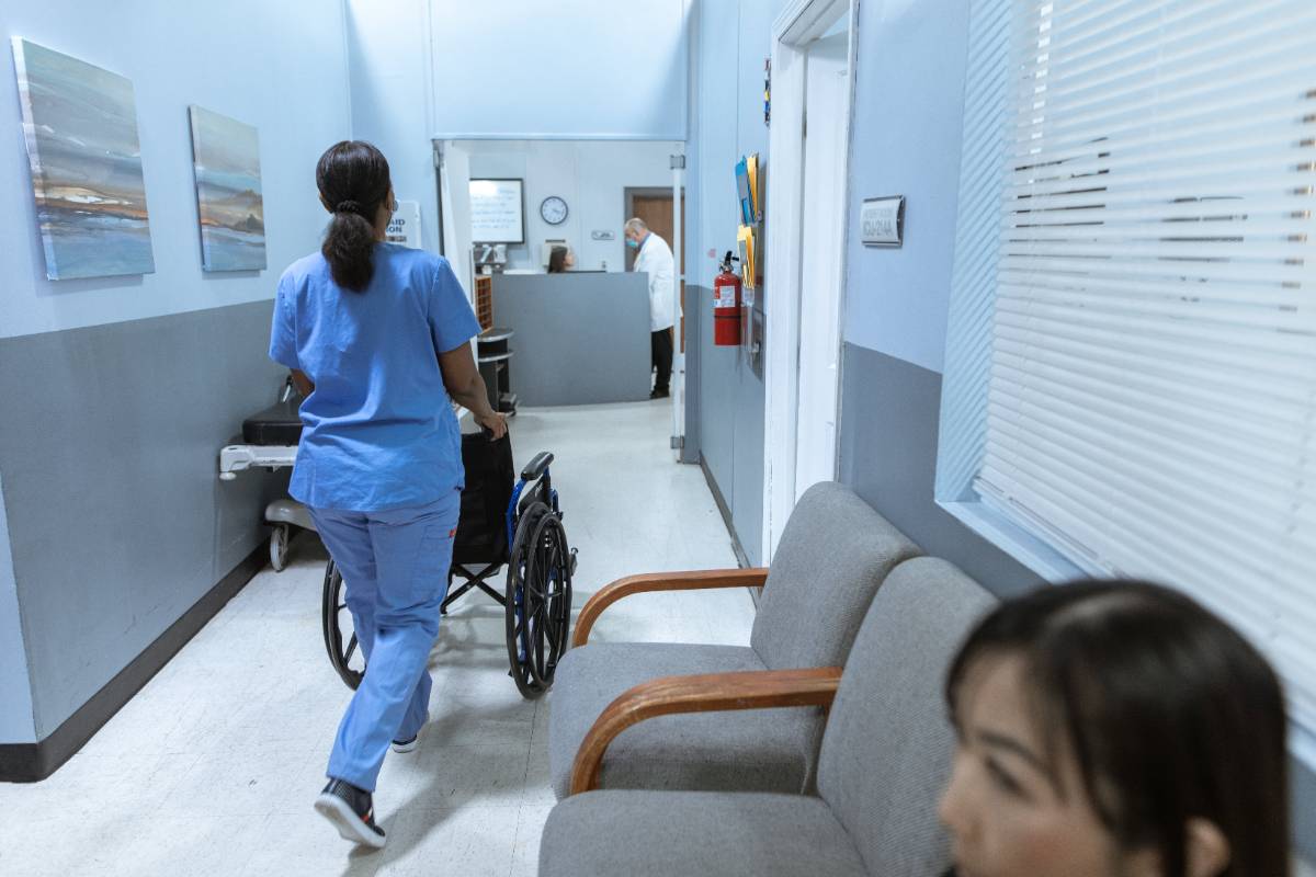 Nurse pushing a wheelchair