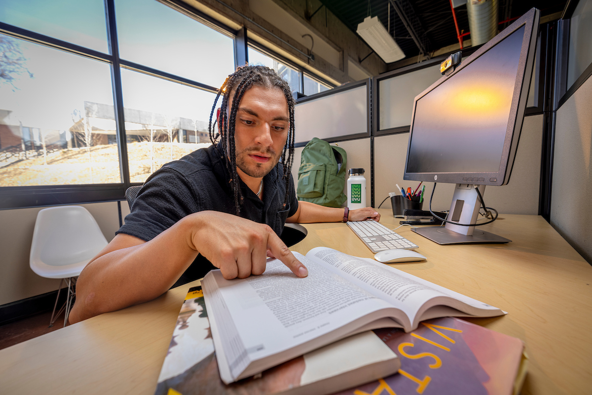 student studying in the library