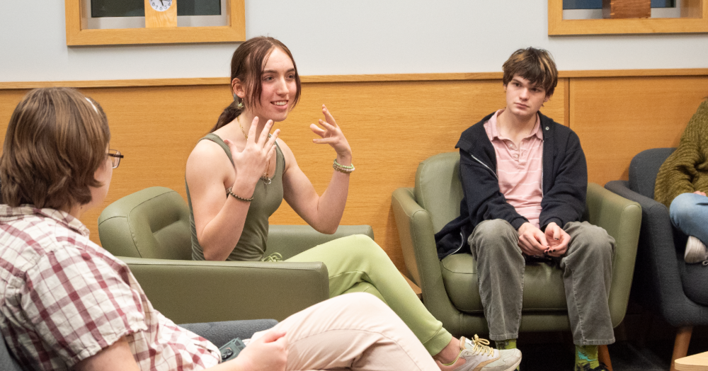 Students engaging in interfaith dialogue in the reflection center