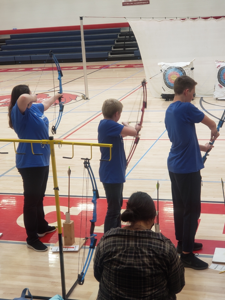 Suzie at Archery tournament