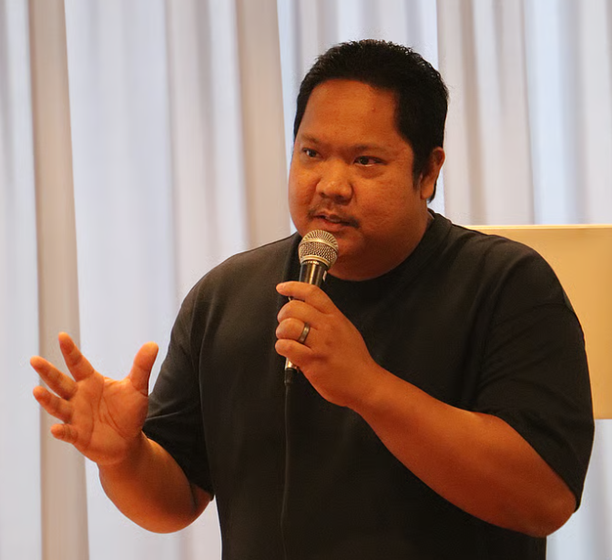 Dr. Carl Canlas represents UVU in partnership with Benilde