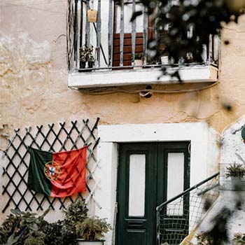 house with portuguese flag