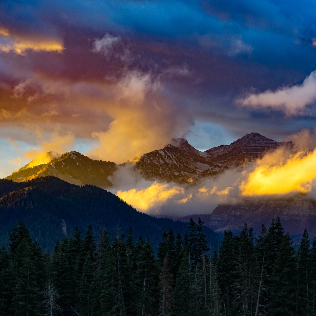 mountaintop covered with low-hanging clouds