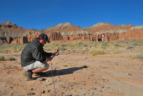 Matt Want surveying land at Capitol Reef National Park