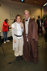 Two people dressed as jedi from starwars