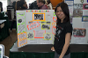 A student and her poster