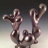 abstract sculpture in a bronze shade