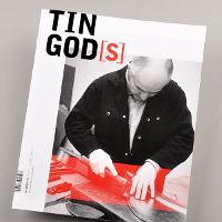 book that says "TIN GOD[S]"