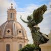 After gawking at the colosseum and overlooking the Roman forum we ended at the steps of the Vittoriano Monument. Looking to both my right and left were these beautiful green angels looking out over Rome, taking care of all below them. Rome, Italy. - Photo by Ellie Robinson