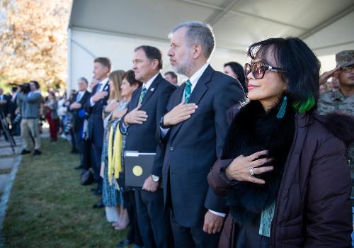 President Tuminez and others during the Pledge of Allegiance