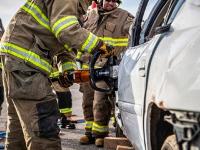 Firefighter using Hydraulic rescue tools