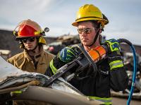 Firefighter using Hydraulic rescue tools