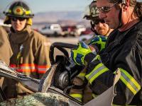 Firefighter using Hydraulic rescue tools