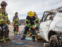 Firefighter using Hydraulic rescue tools