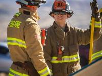 Two firefighters with axes