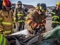 Firefighter using Hydraulic rescue tools