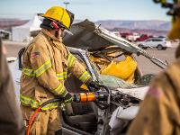 Firefighter using Hydraulic rescue tools