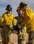 Firemen using tools