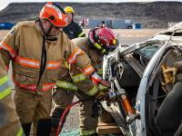 Firefighter using Hydraulic rescue tools