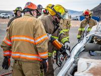 Firefighter using Hydraulic rescue tools