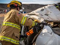 Firefighter using Hydraulic rescue tools