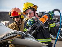 Firefighter using Hydraulic rescue tools