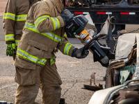 Firefighter using Hydraulic rescue tools