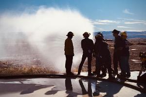 Closeup of Firefighters spraying firehose