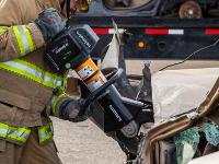 Firefighter using Hydraulic rescue tools