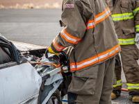 Firefighter using Hydraulic rescue tools