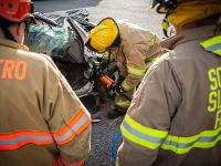 Firefighter using Hydraulic rescue tools